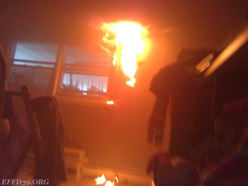 what first due member saw in a small fire in the walls of houes