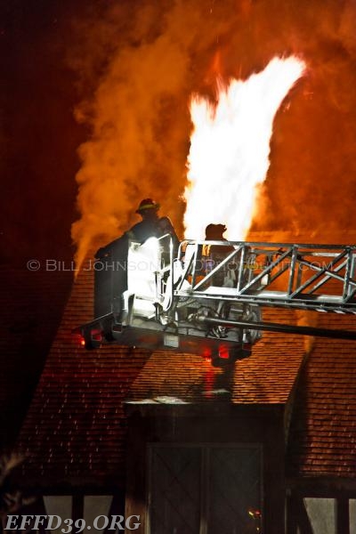 EF members cutting roof 