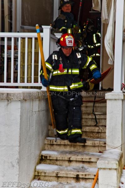 East Fishkill - Members work hard at a stubborn basement fire at a multifamily house. 