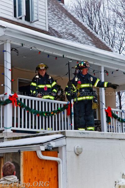 East Fishkill - Members work hard at a stubborn basement fire at a multifamily house. 