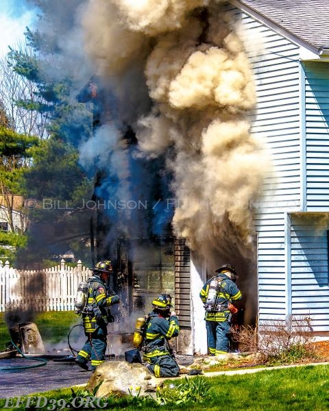 Members make quick Search  heavy fire in garage and basement.