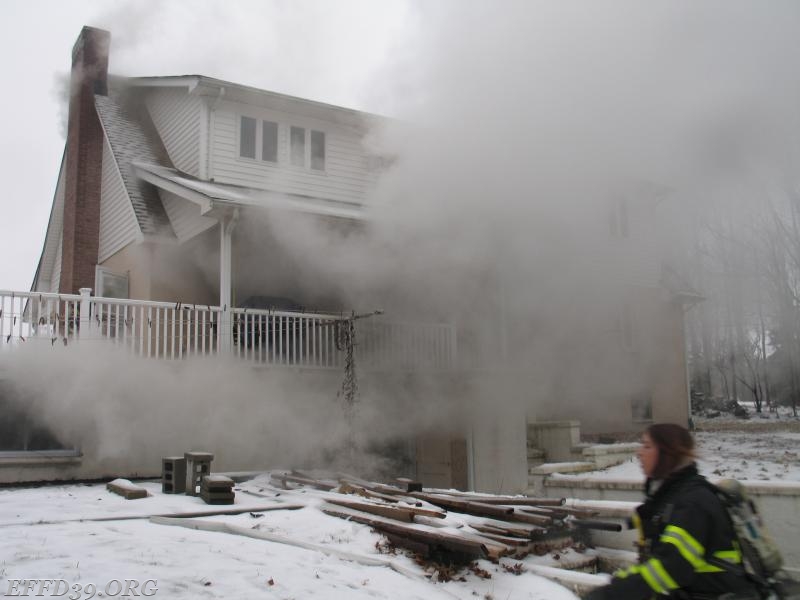 EF knock down working fire in large houes,