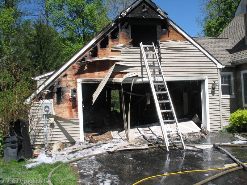 EF Worked fast to stop a fast moving fire in a garage. Stopped fire from entering the house.