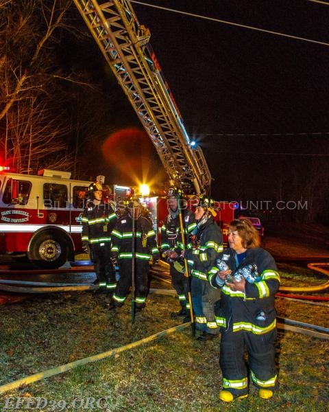 EF Mambers work at fire at top of stromvill
