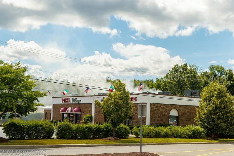 EF Mambers work at fire at village pizza